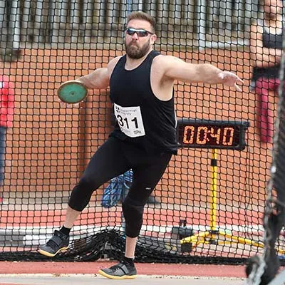 Dan Greaves throwing a discus