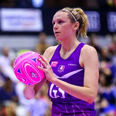 Jo Harten holding a netball