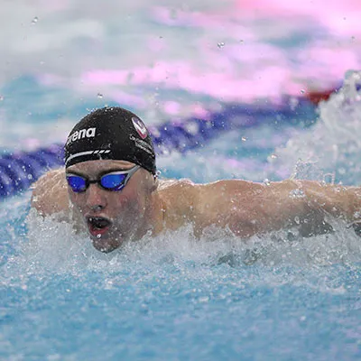 Sean McCann racing in the pool