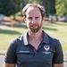Gavin Smith stood outside wearing a grey Loughborough Sport top.