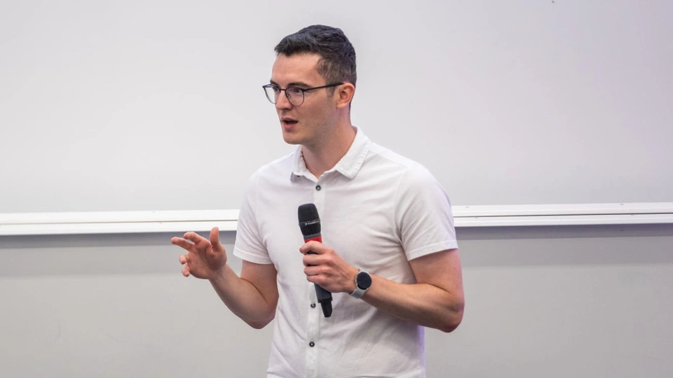 Doctoral researcher Matthew Putland presenting