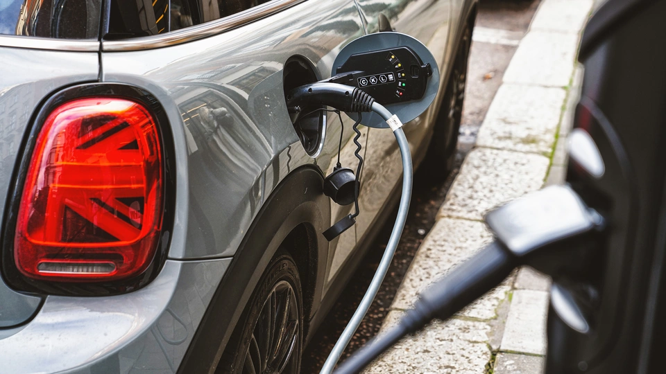 mini plugged into charging point