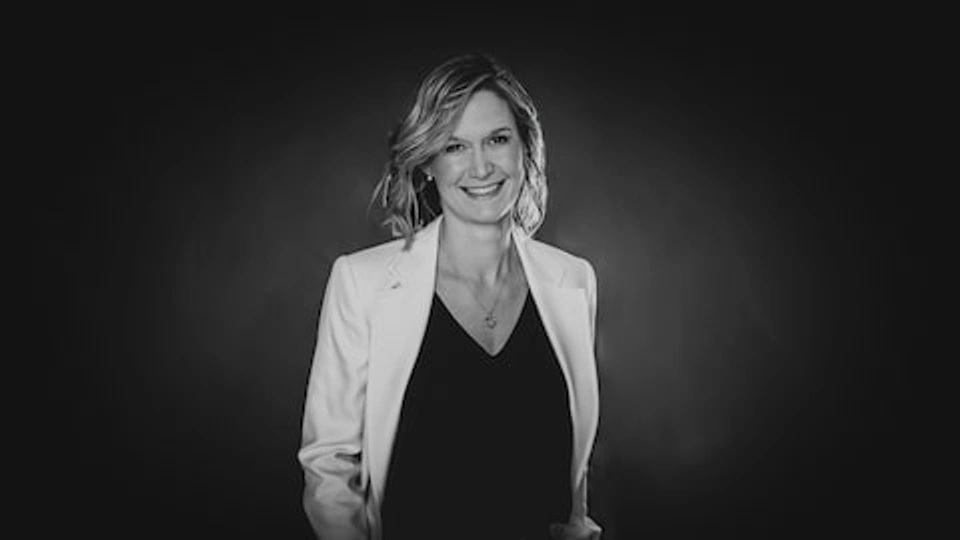 A black and white image of Sarah Brennand