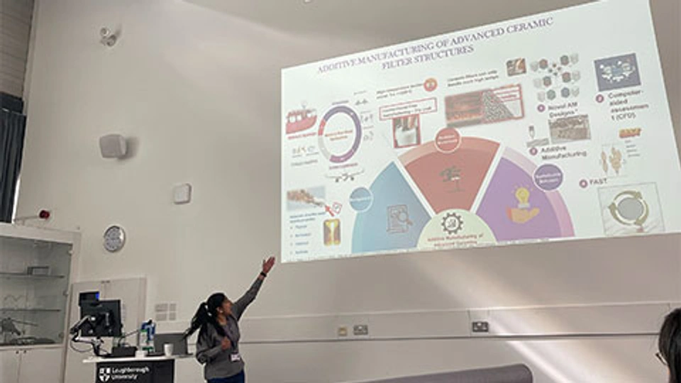 Parvathi delivering a talk at the AACME 3MT competition