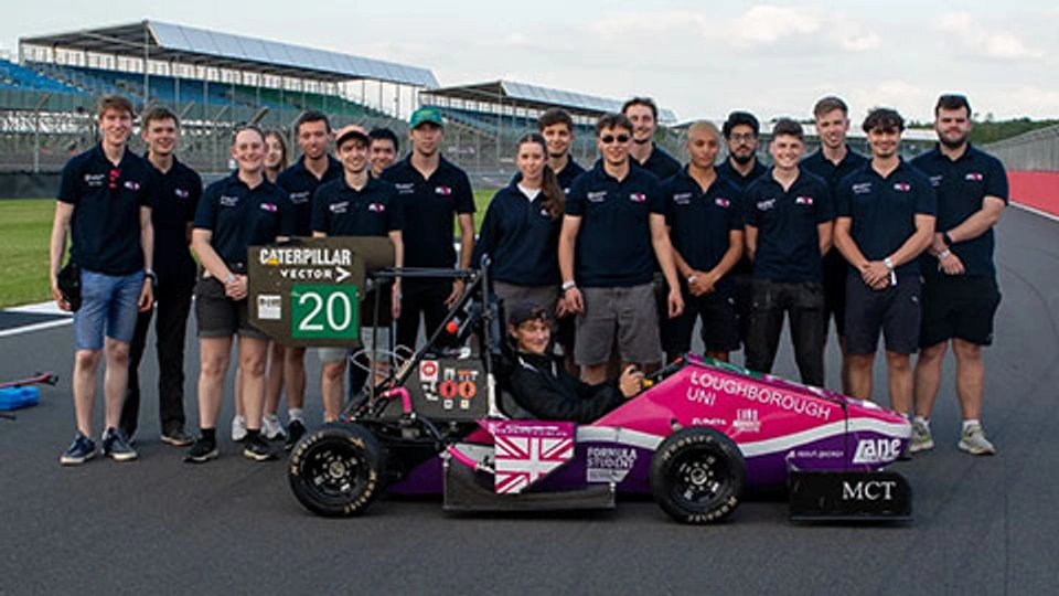 LUMotorsport team with car at Silverstone.