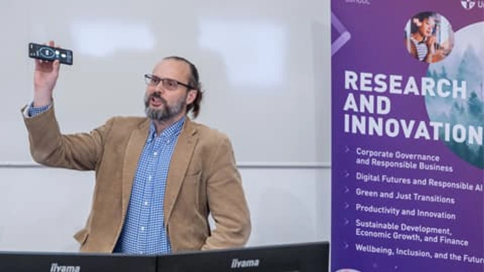 Dr Martin Sykora presents to the Loughborough Business School research themes launch audience.