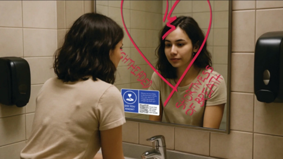 Mock up of a woman looking into a mirror with promotional information on it