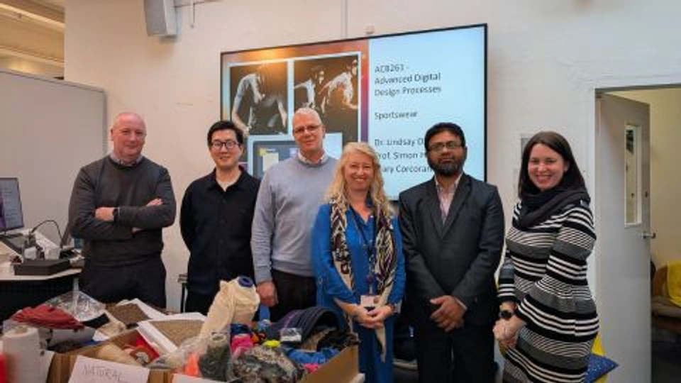 Shima staff stood with SDCA staff in a group photograph