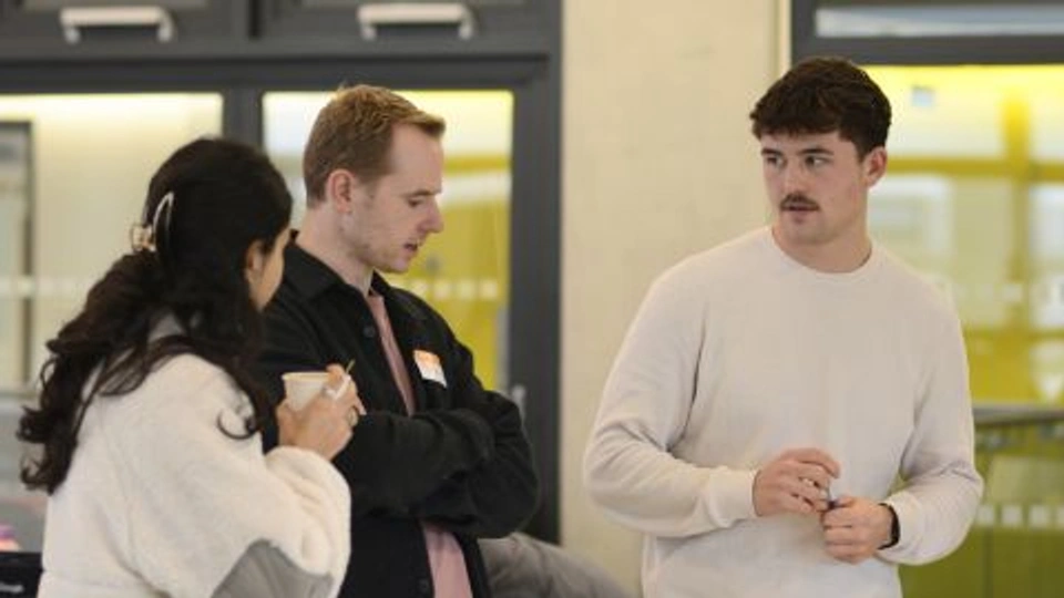 Photograph of students and industry at UXathon 2025