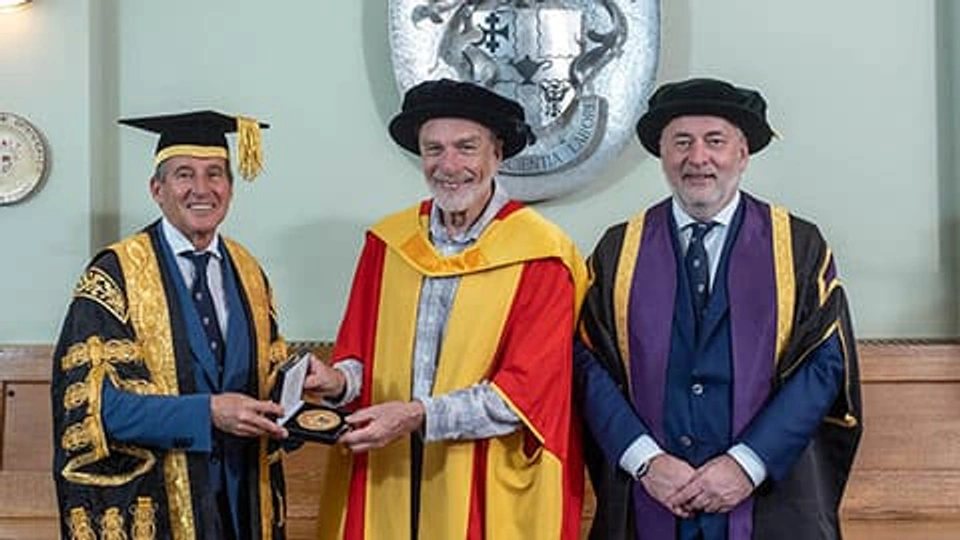 Professor Roger Smith being presented medal by Lord Sebastian Coe KBE and Professor Nick Jennings CB FREng FRS