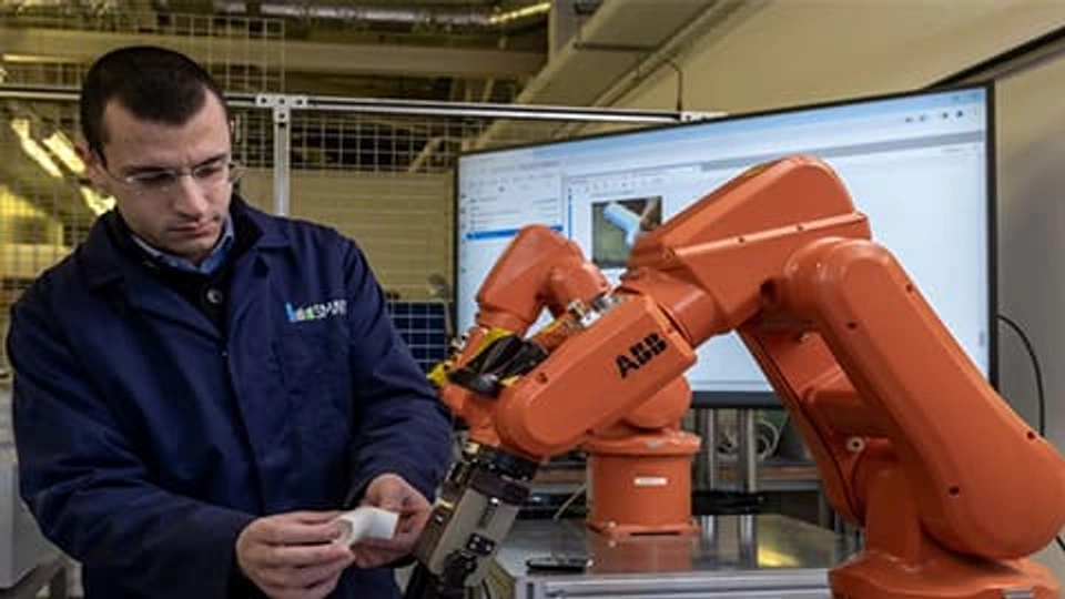 Engineer in lab with machine