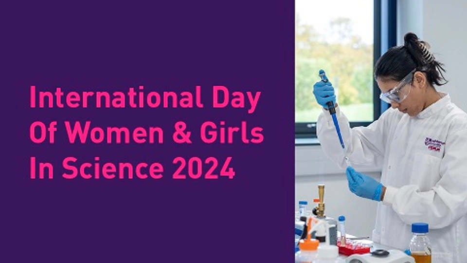 A poster for the event containing an image of a female student working in a chemistry lab.