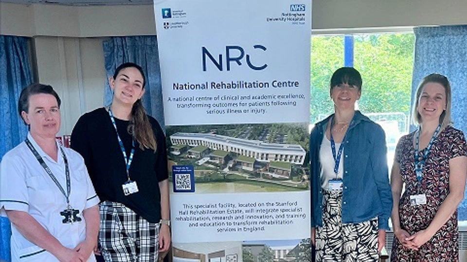 Staff from Linden Lodge posed around promotional banner for NRH