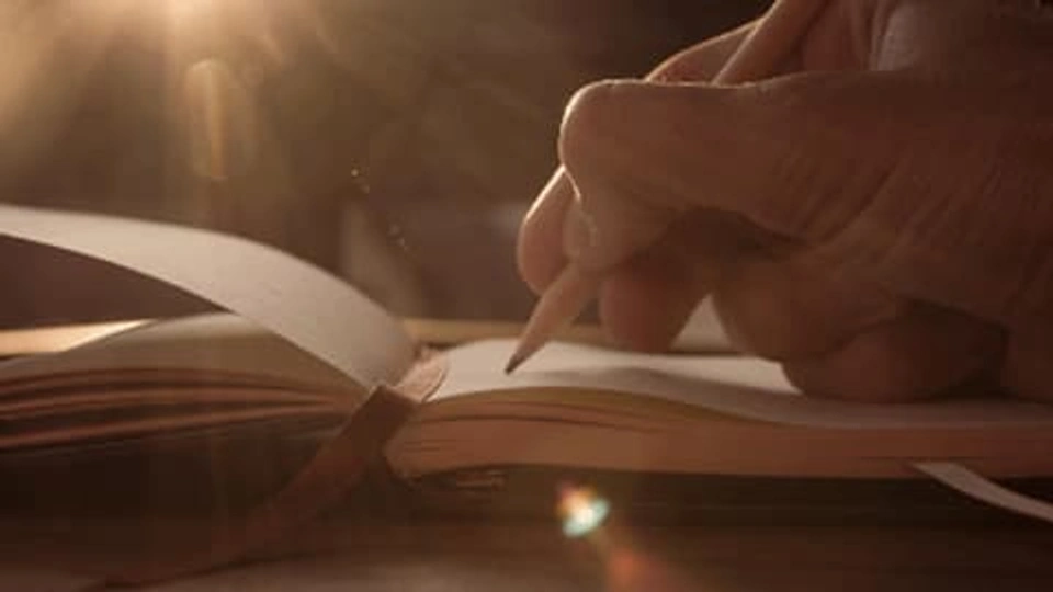 close up of hand writing