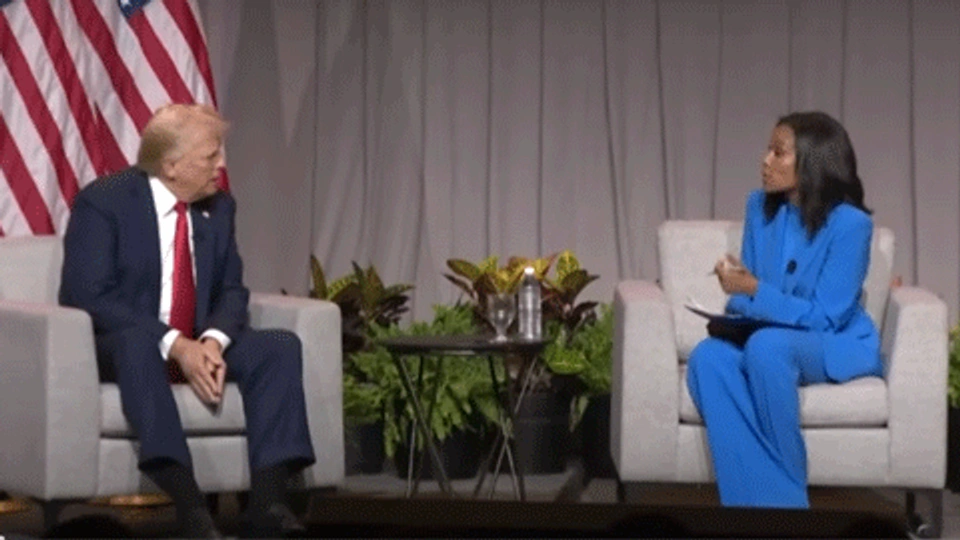 Donald Trump being interviewed on stage