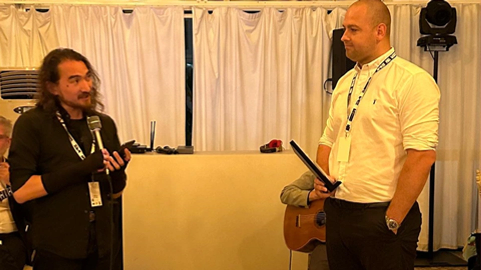 Dom Willmott recives the European Scientific Impact Award