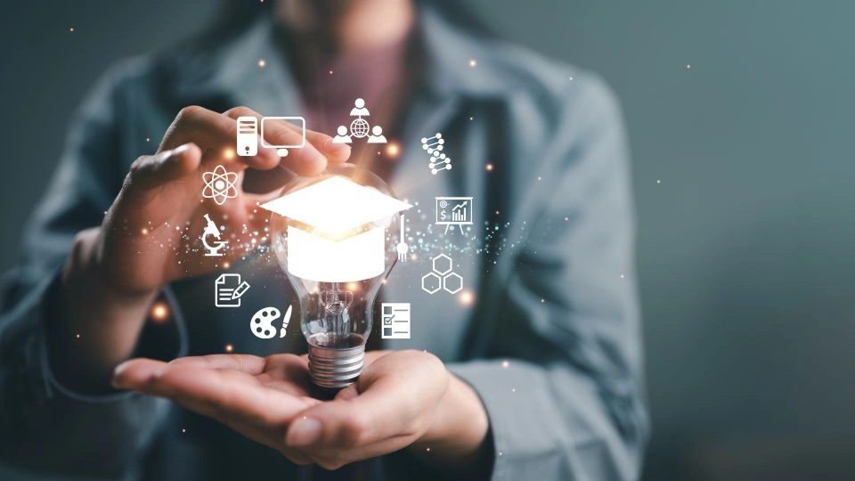 A woman is holding a light bulb with images around it signifying education and new ideas.