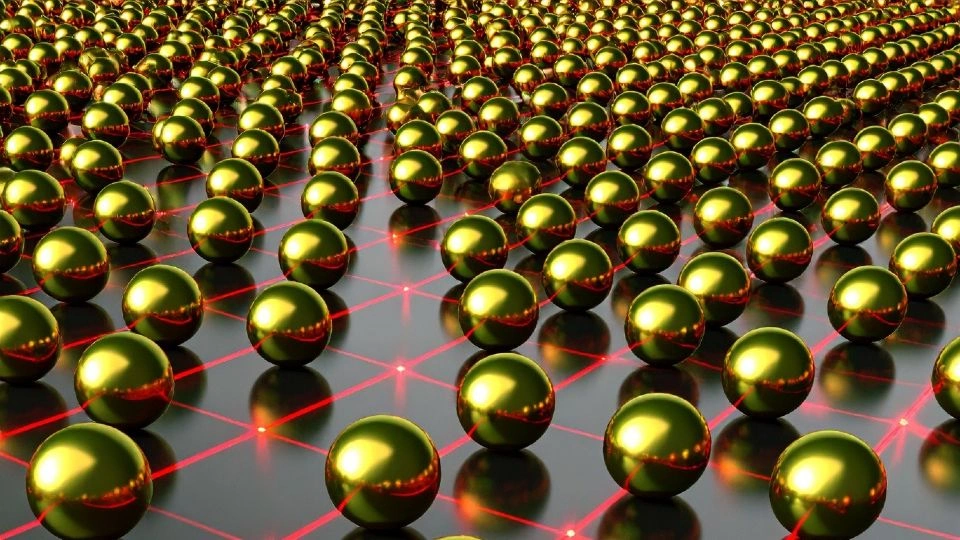 Artist’s impression of silica–gold nanoparticles acting as “light concentrators”, focusing energy into tiny hotspots to boost terahertz emission. The effect was studied using ultrafast laser pulses. Image generated by Dr Vittorio Cecconi using Adobe Firefly.