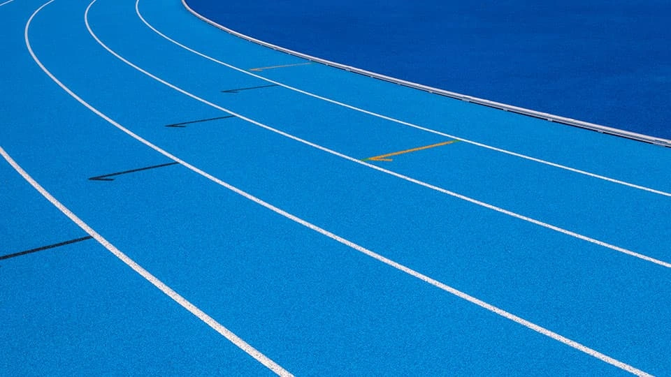 A close up of the lanes on a running race track