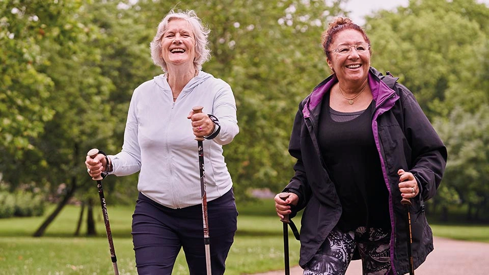 Two women enjoy Nordic walking