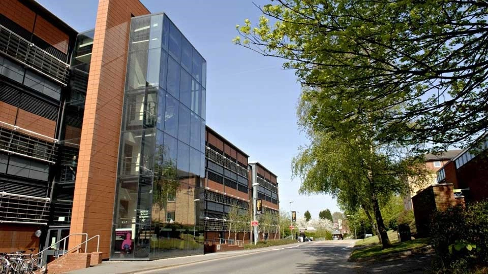 Outside the Wolfson Building of Engineering at Loughborough University on a sunny day
