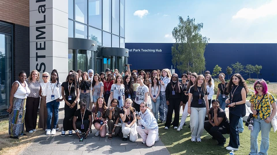 A group of Year 10 students in front of a building