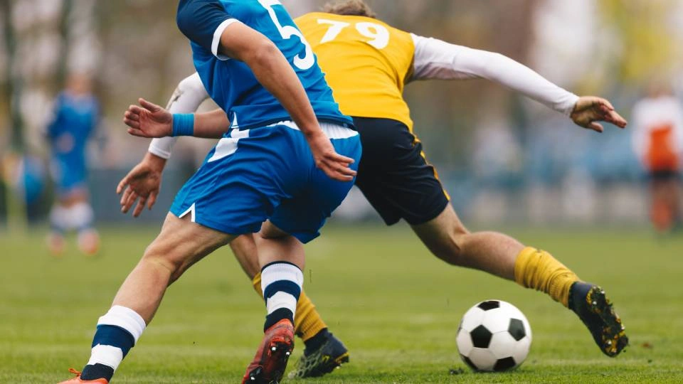 two players playing football