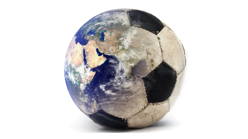 a soccer ball morphing into an atlas