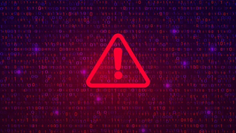 codes on a digital screen with a red triangular warning sign positioned over the top