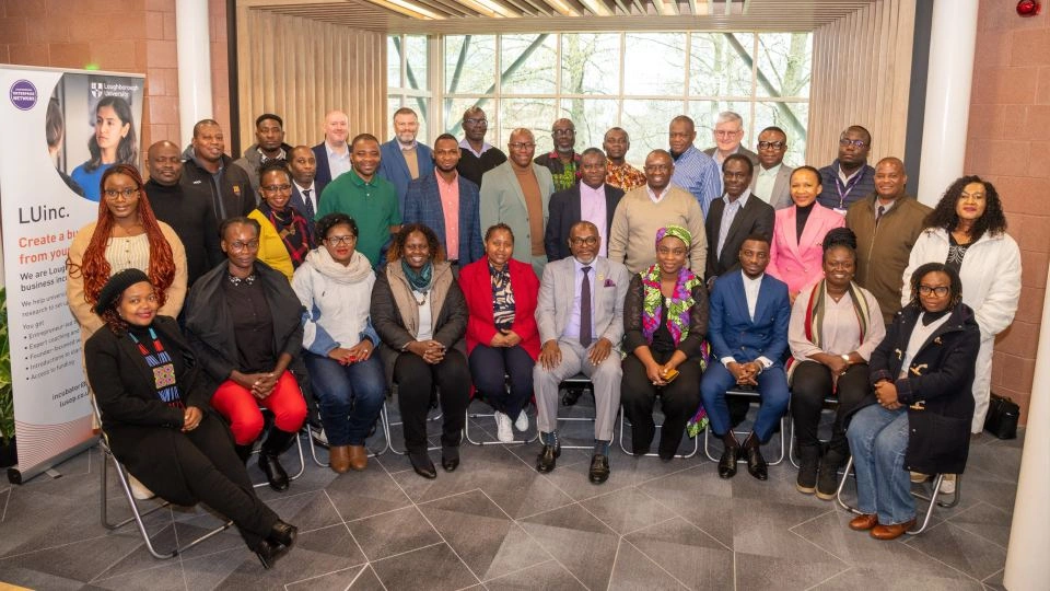 Photo of representatives from the Department for Business and Trade along with delegates from Sub-Saharan Africa sat inside in the Holywell Building
