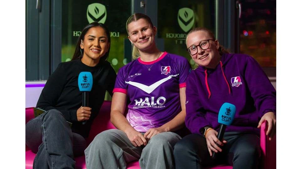 Loughborough Lightning players Hannah Langford and Morgan Rogers sitting together smiling with one of the hosts from the show