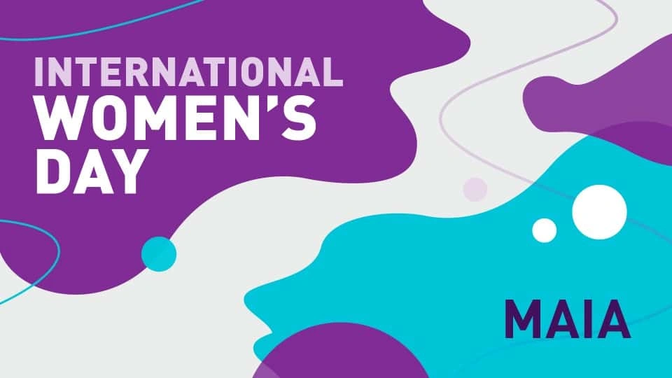 Blue and purple squiggles with text reading "International Womens Day Maia"