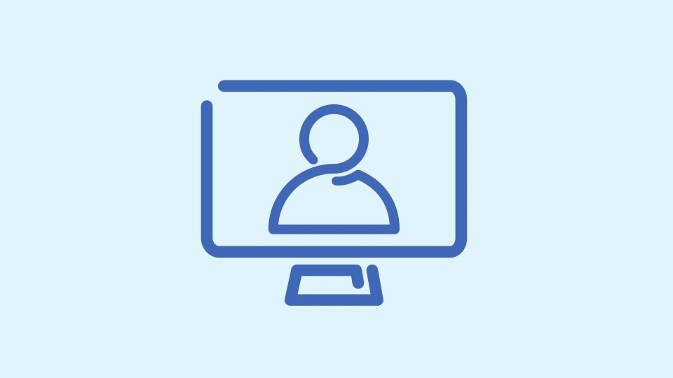 Blue icon of a person on a computer monitor.
