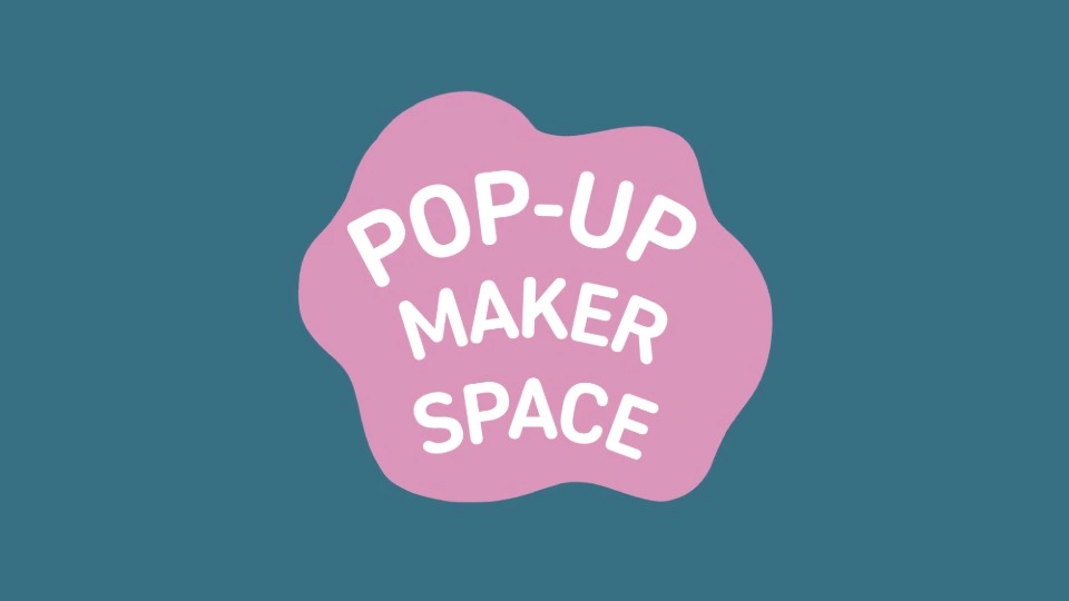 Text reading 'Pop-Up Maker Space' in a pink bubble on a cyan background