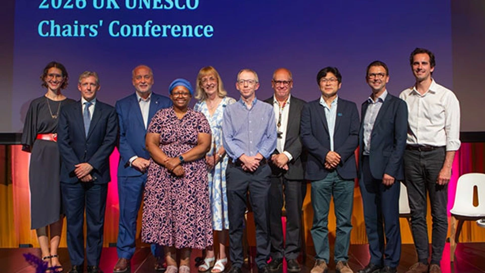 Delegates onstage including Vice Chancellor Nick Jennings and several UNESCO Chairs