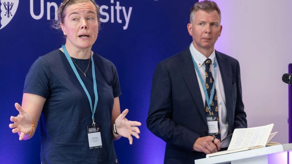 Veteran Vicki Ross speaking at an event with Dr Jamie Barker