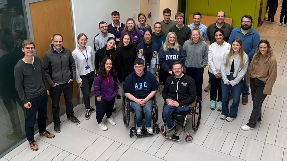 A picture showing the new ParaFit research cluster students along with their colleagues from the Peter Harrison Centre for Disability Sport