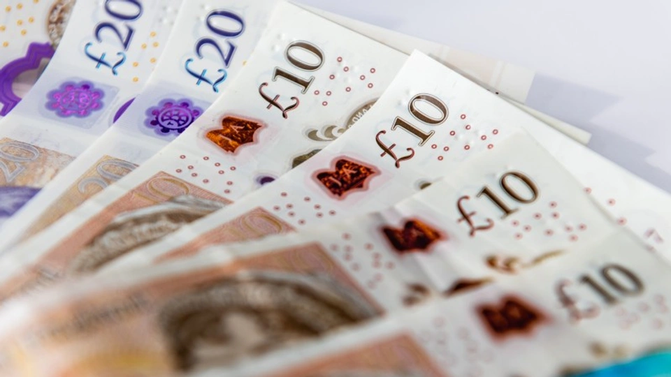 English pound notes fanned out