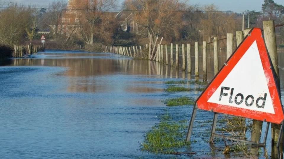 A flooded road in the UK