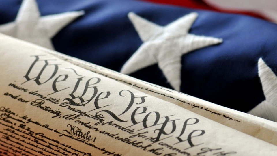 The US Declaration of Independence and the American flag